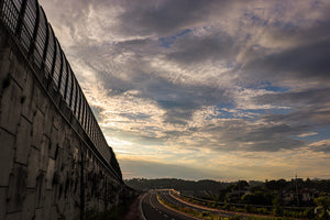 next to the railroad tracks